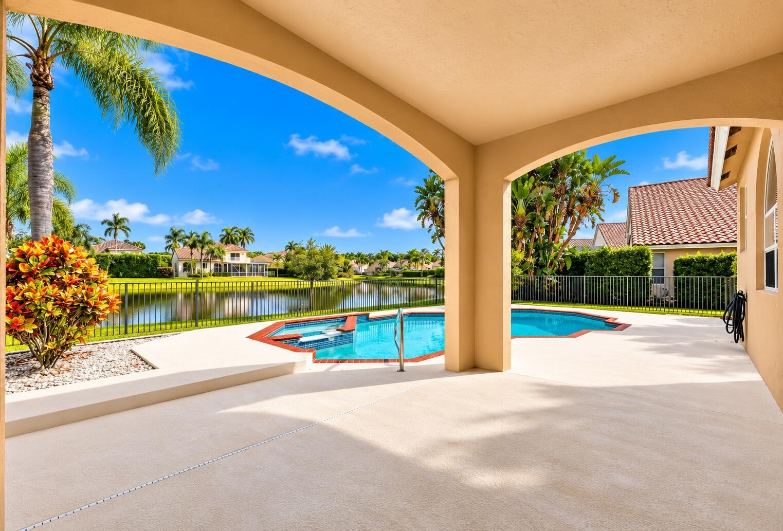 This is what South Florida living is all about! A beautiful private pool, inviting spa, tropical surroundings, and stunning waterfront views combine t