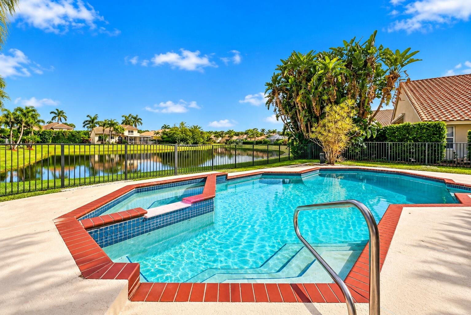 Imagine spending your afternoons lounging poolside and your evenings unwinding in the spa, all while enjoying peaceful, unobstructed views of the lake