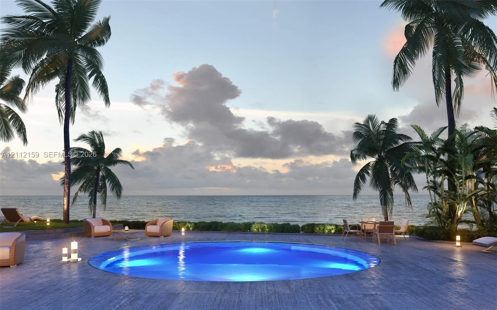 Circular pool featuring a stone-tiled deck, surrounded by mature palm trees and coastal scenery