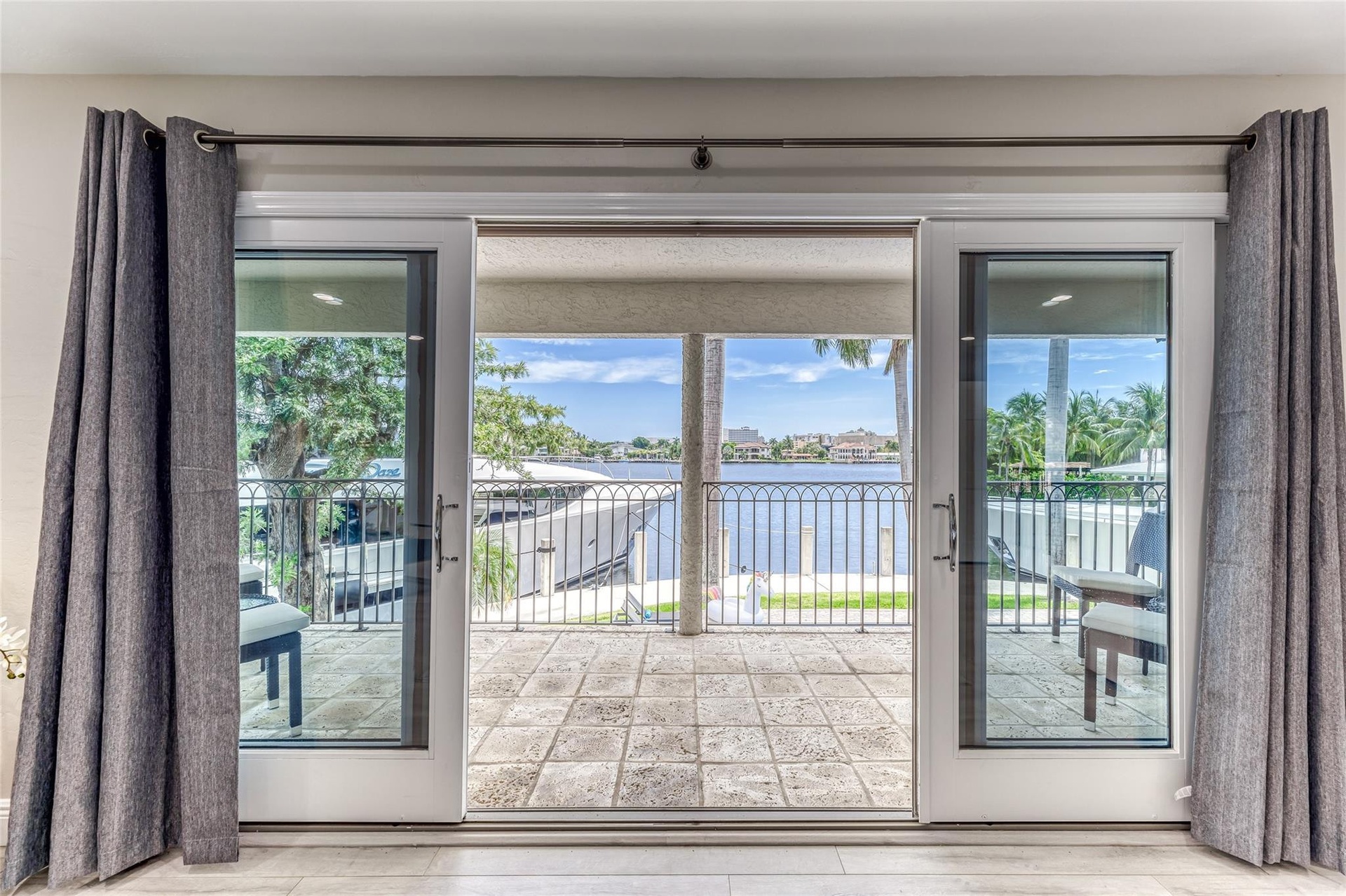 BEDROOM #1 (Upstairs) KING Size with Balcony overlooking waterway, En Suite bathroom w jacuzzi tub & seperate shower, Walk in closet, Smart TV