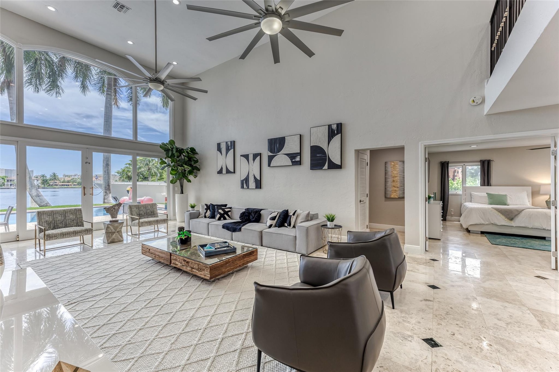 Open Layout Family Area overlooking Waterway & Pool Area