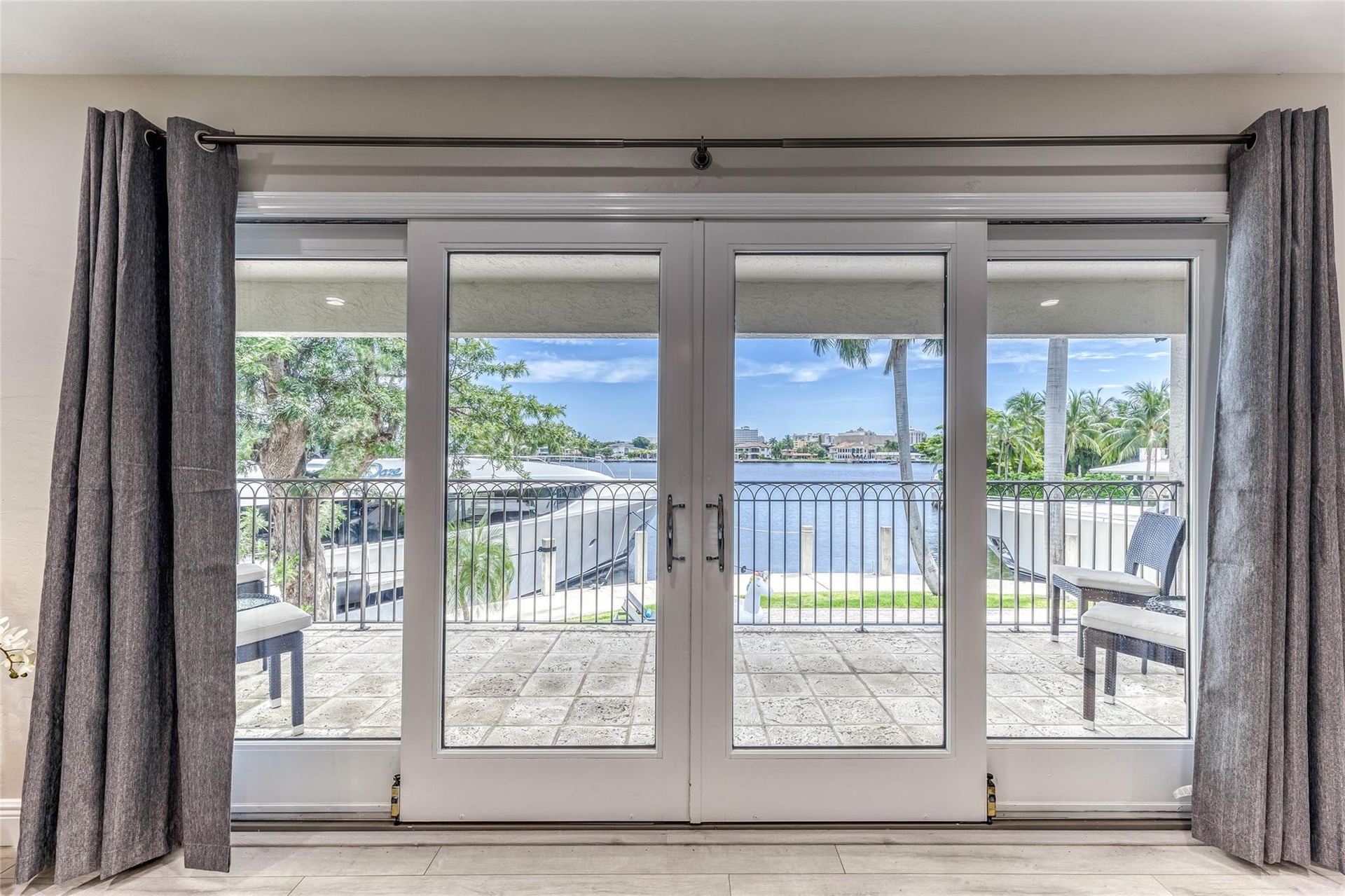 BEDROOM #1 (Upstairs) KING Size with Balcony overlooking waterway, En Suite bathroom w jacuzzi tub & seperate shower, Walk in closet, Smart TV