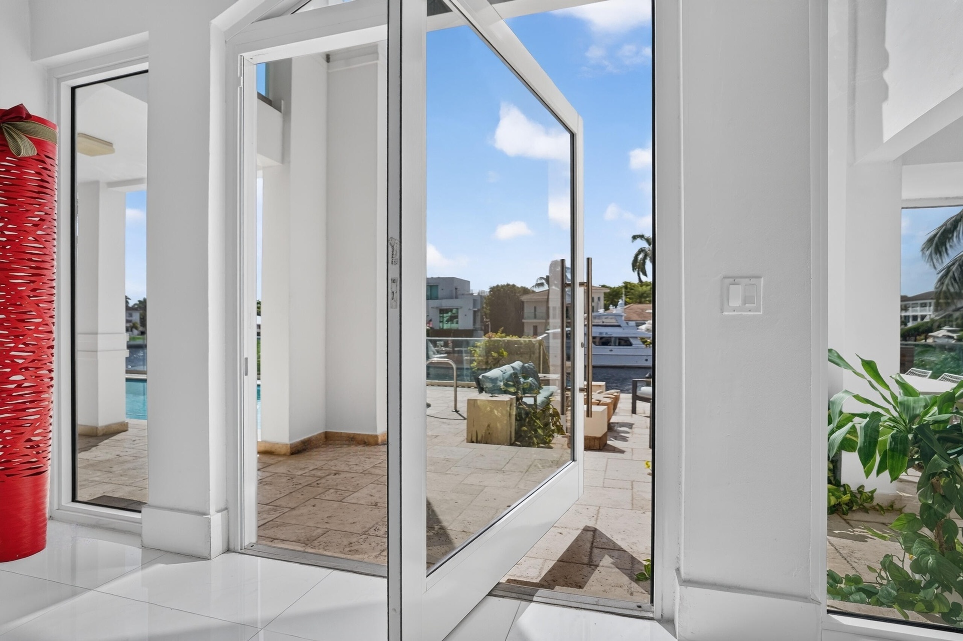 GLASS PIVOT DOOR TO OUTSIDE