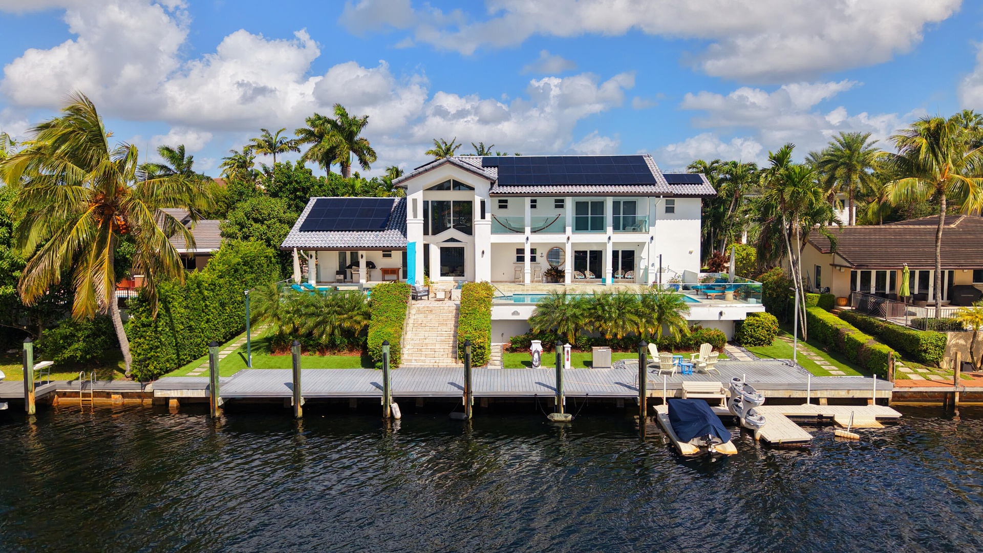 FULL AERIAL VIEW OF BACKYARD AND DOCK