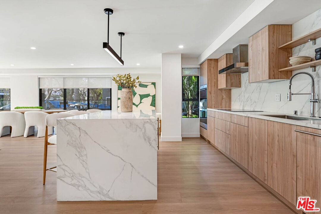 Kitchen with Wood Paneled Appl