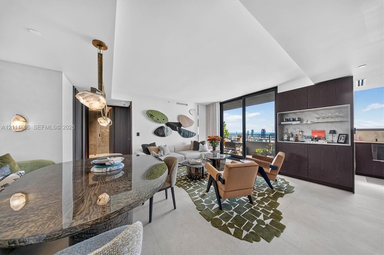 Vertical wood-slat wall paneling, flush-mount ceiling lighting, and large-format tile flooring