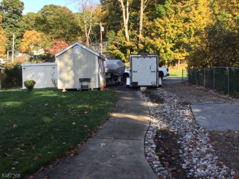 View to street w/ storage shed