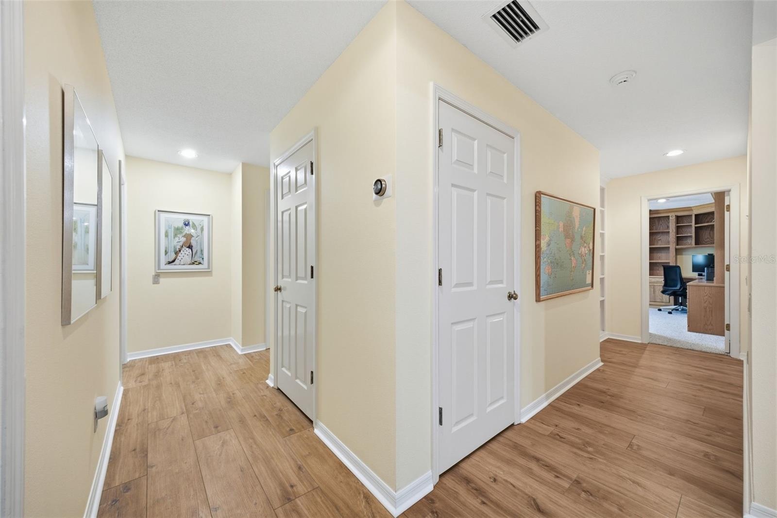 Second Floor hallway to bedrooms and linen closet.