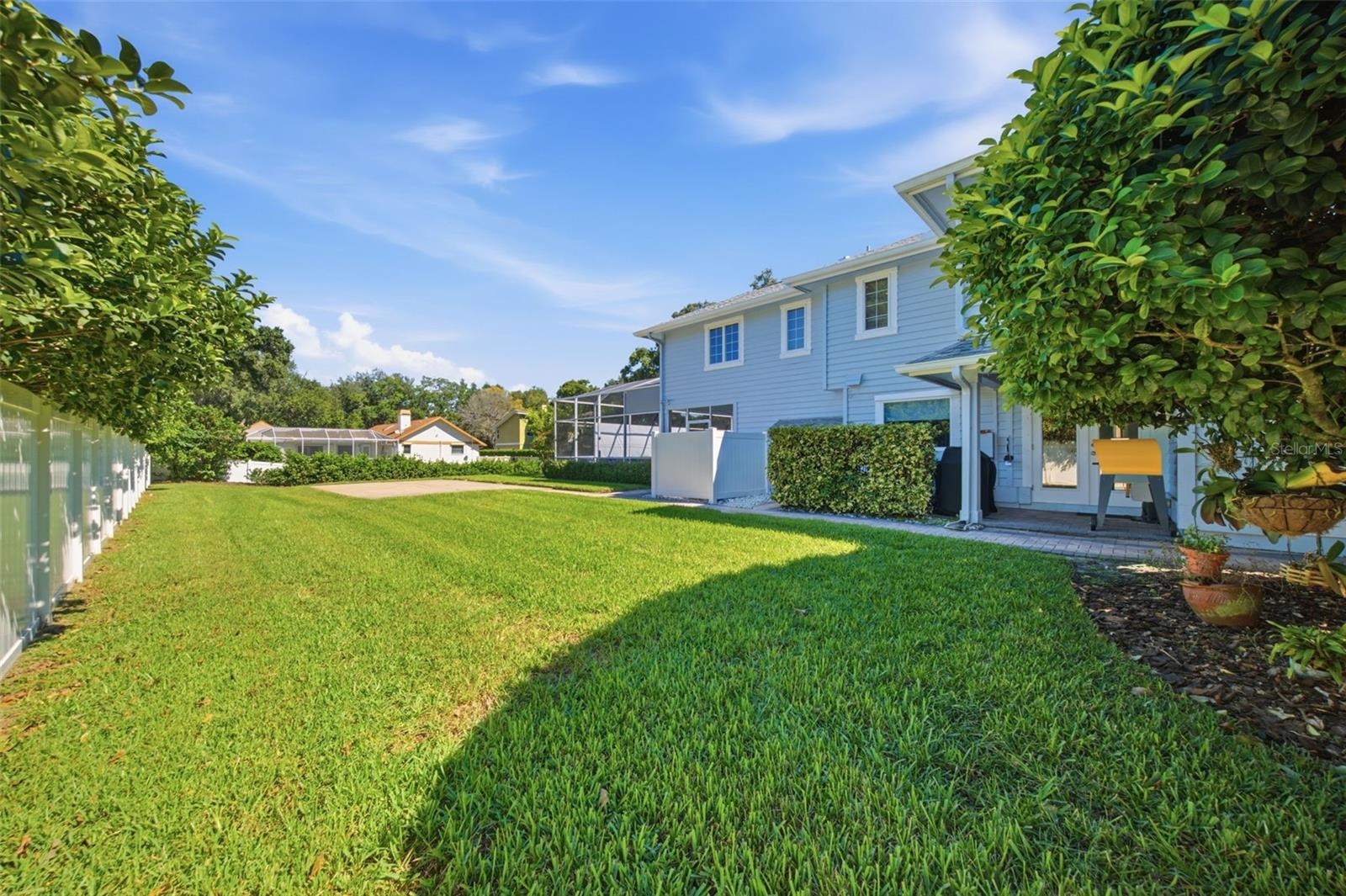 Large lush green lawn on an oversized lot