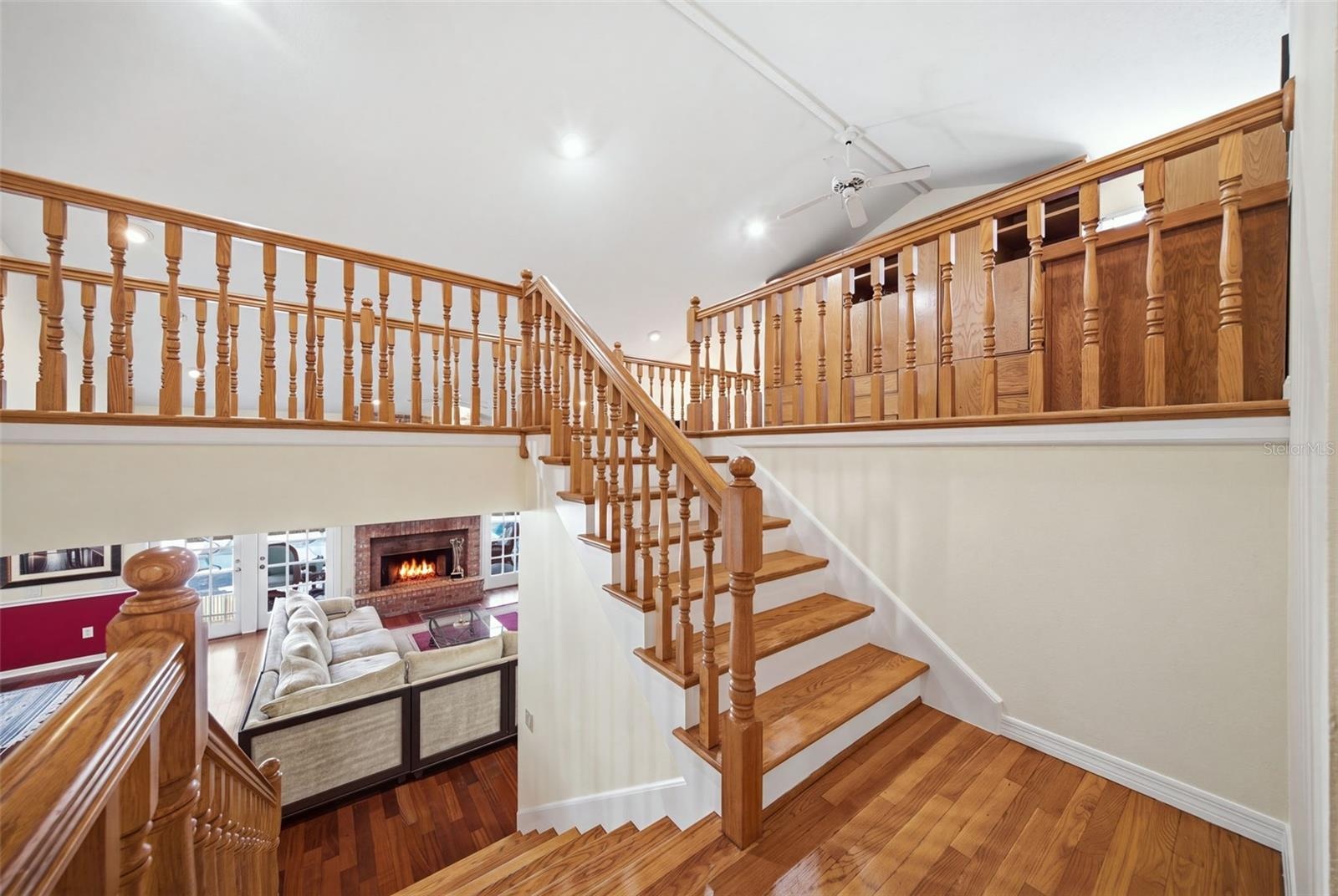 Mid-Floor landing wood staircase.