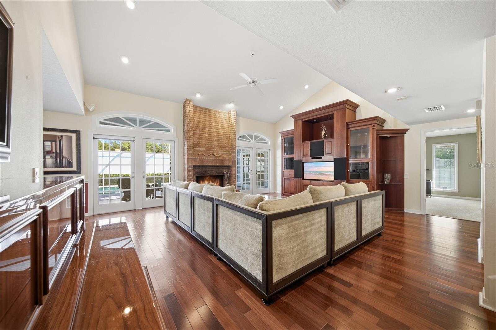 Family Room with views to the enclosed pool area.