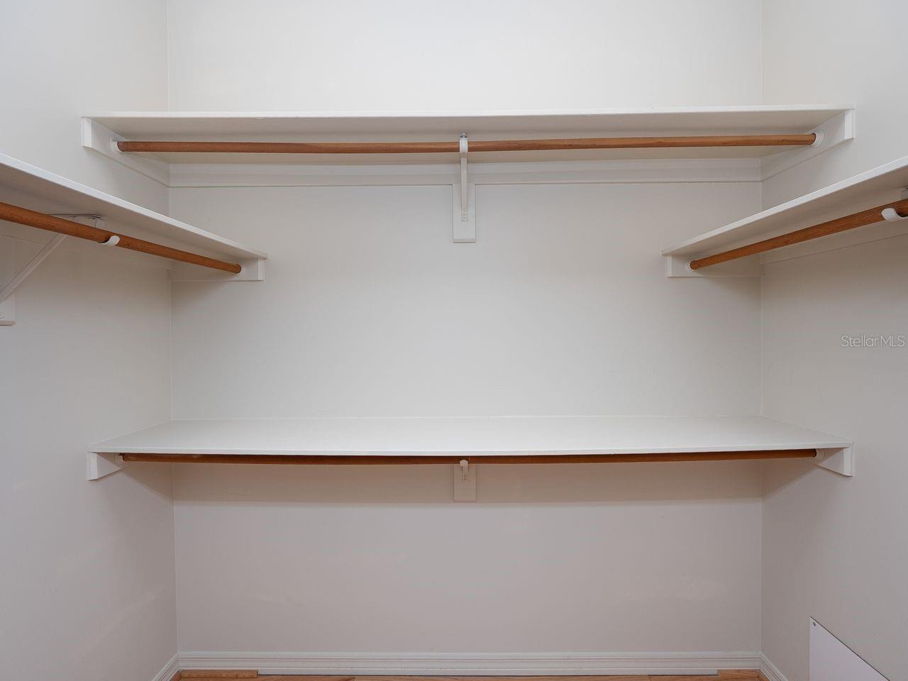 walk in closet in primary bedroom