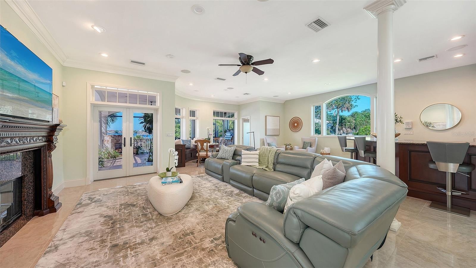 plenty of views of the water in this expansive family room