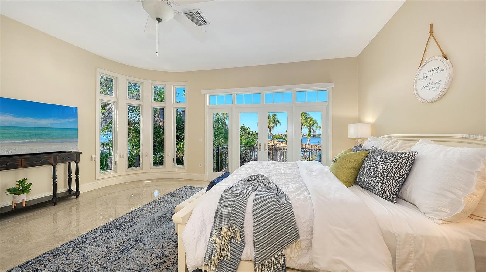 first floor primary bedroom with balcony and stunning views