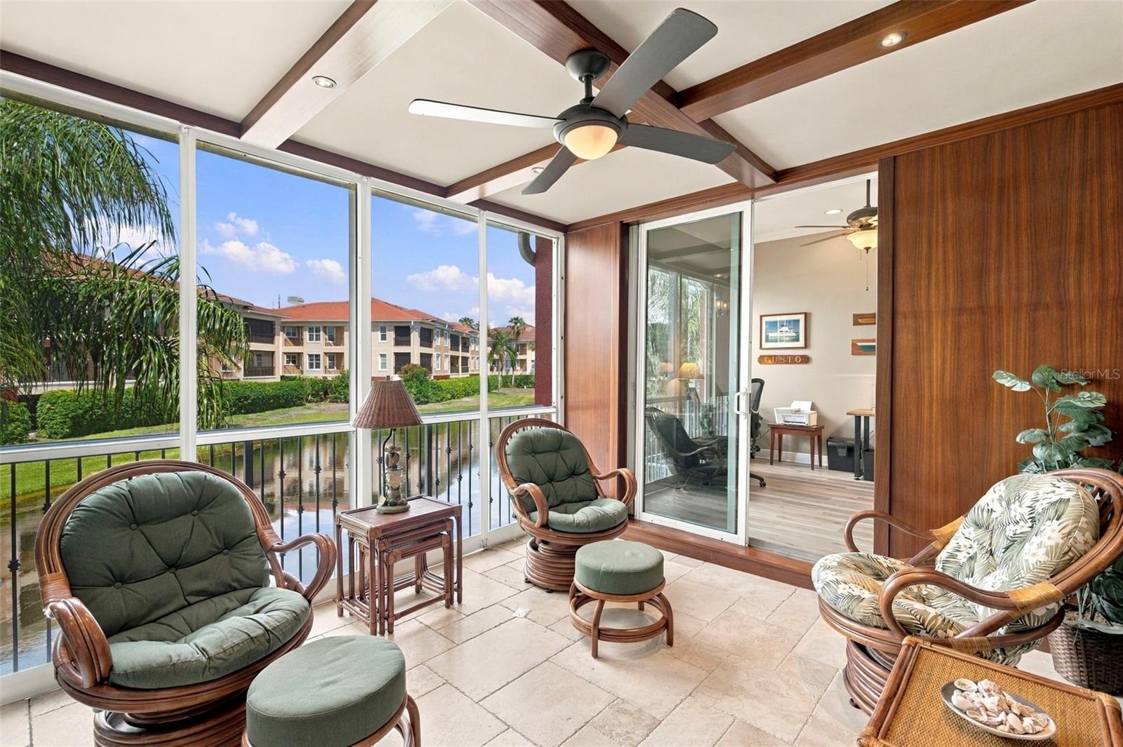 One of a kind outdoor space showcases beautiful African Mahogany trim, teak wall panels, and an impressive 14 coats of varnish, reflecting the craftsm