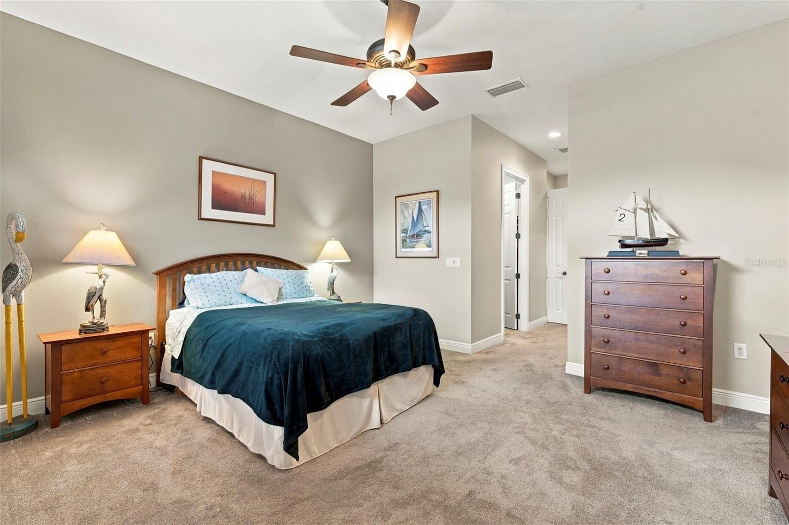 Primary Bedroom with En-Suite Bathroom, His & Her Walk-in Closets, Double sinks with Granite countertops, jacuzzi tub, separate shower