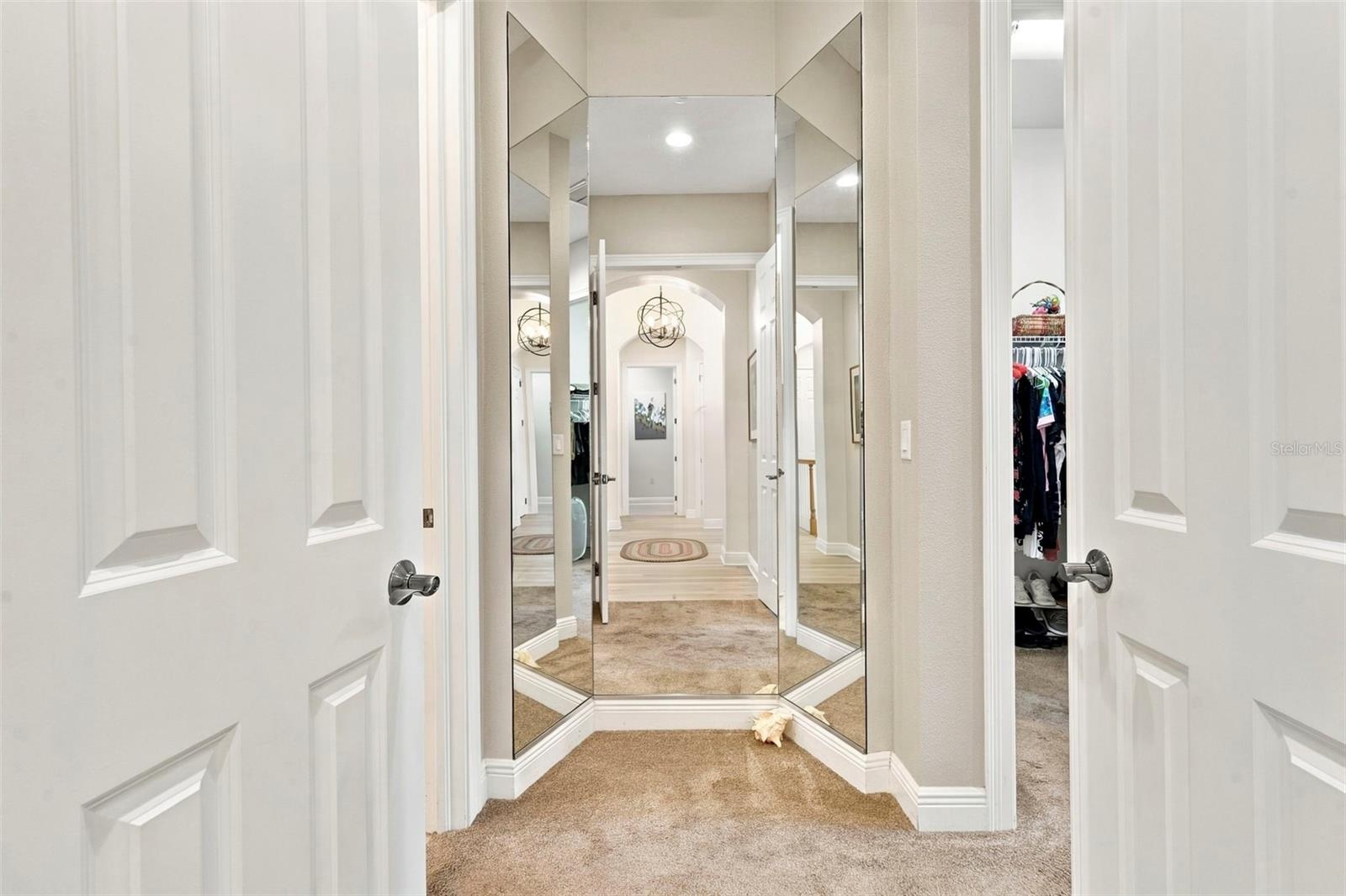 Primary Bedroom with En-Suite Bathroom, His & Her Walk-in Closets, Double sinks with Granite countertops, jacuzzi tub, separate shower