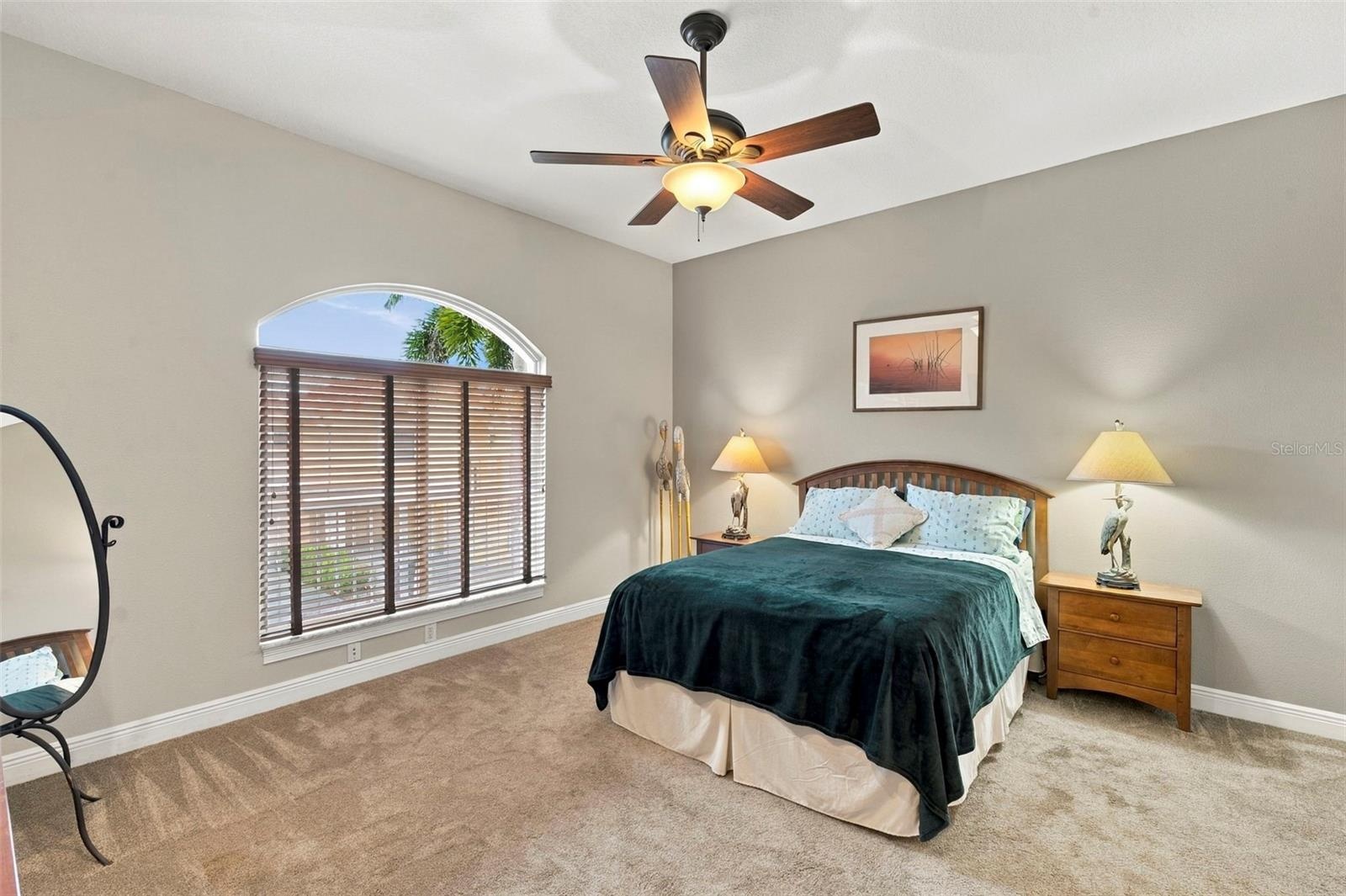 Primary Bedroom with En-Suite Bathroom, His & Her Walk-in Closets, Double sinks with Granite countertops, jacuzzi tub, separate shower