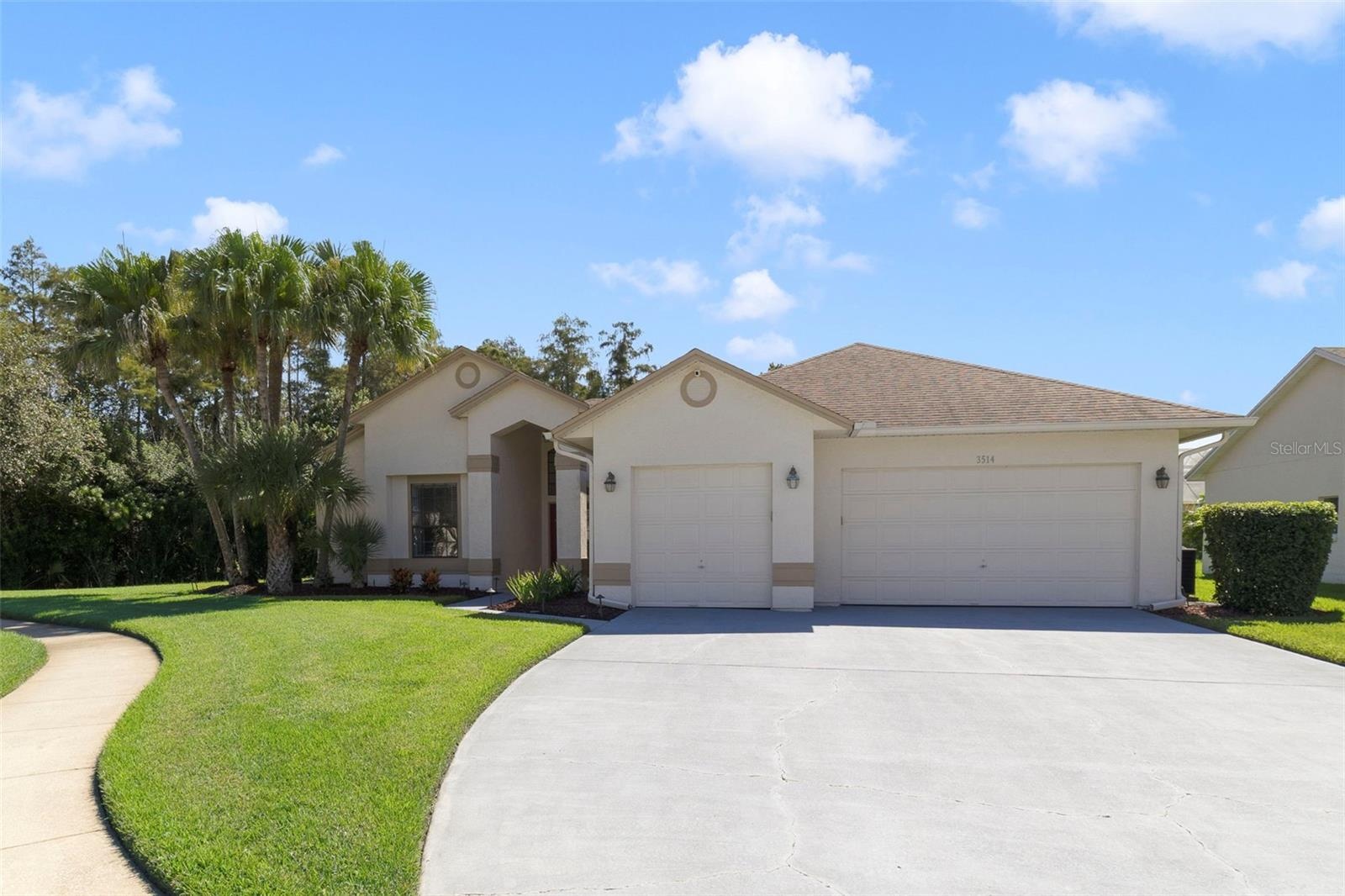 3 car garage with custom workshop, huge driveway
