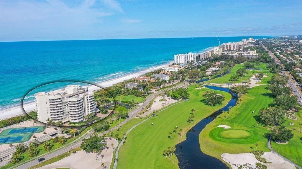 Spectacular aerial views showcase the turquoise Gulf waters, lush fairways, and exceptional coastal setting of the Longboat Key Club.