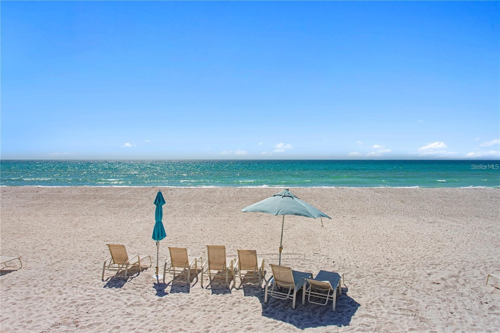Enjoy the exceptional beachfront lifestyle with private access to the pristine shores of Longboat Key.