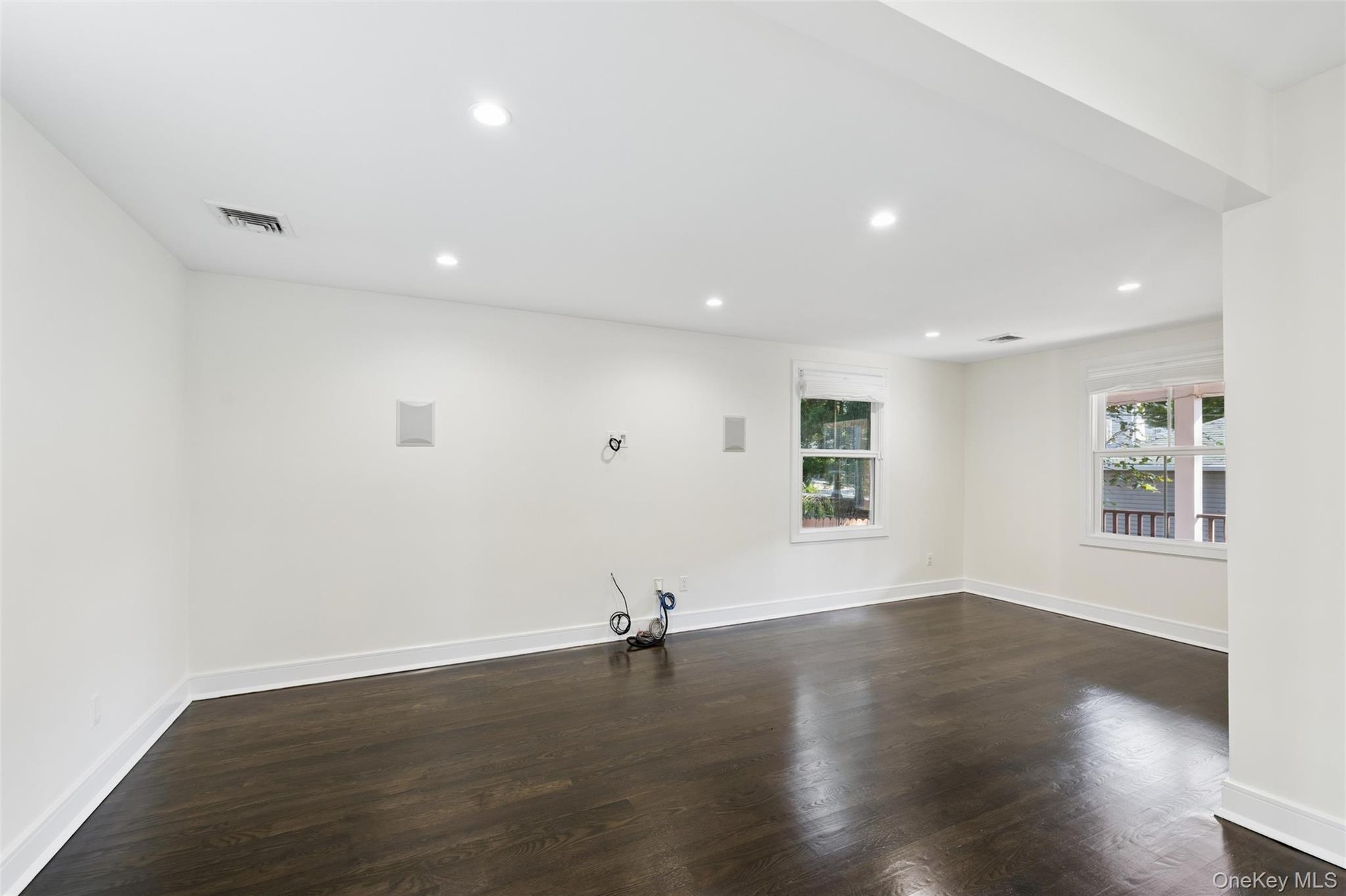 Living Room with Sound System and Pocket Doors