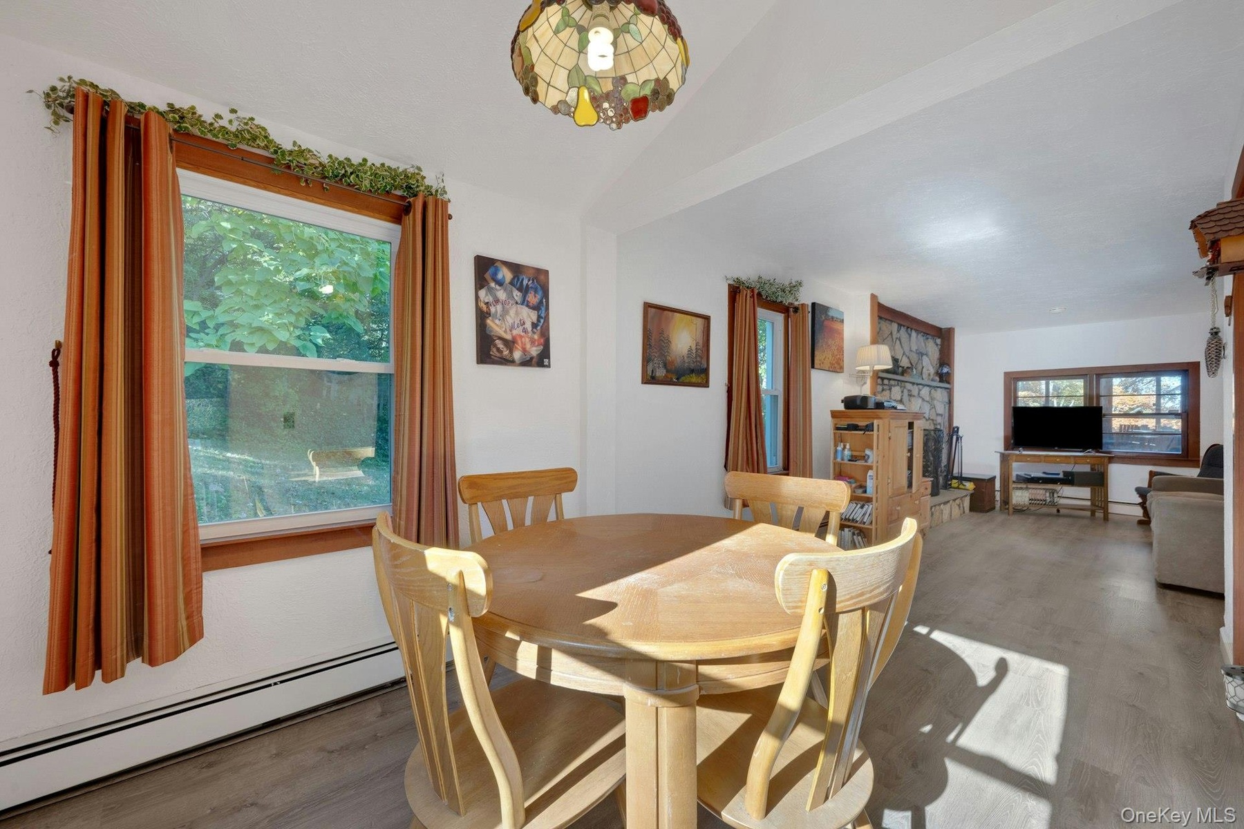 Notice that the open floor plan allows for extending the dining area if needed.