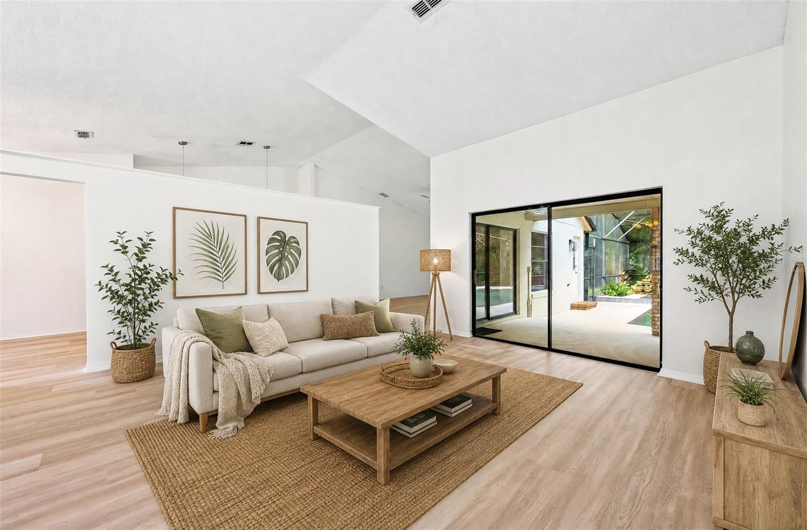 In the Living Room, sliding glass doors open to the PATIO AND POOL AREA—perfect for entertaining or enjoying a relaxed evening at home. Virtually Stag
