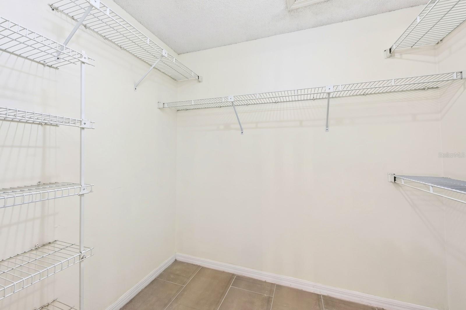 The Primary walk-in closet provides generous storage.