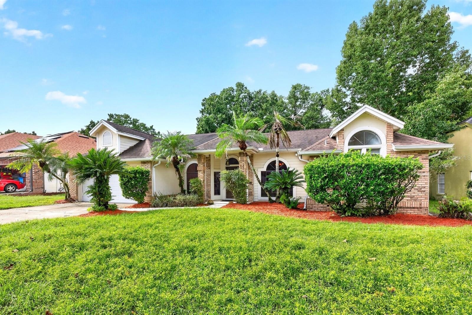 Welcome to this MOVE-IN READY POOL HOME in the sought-after Twin Rivers community of Oviedo!
