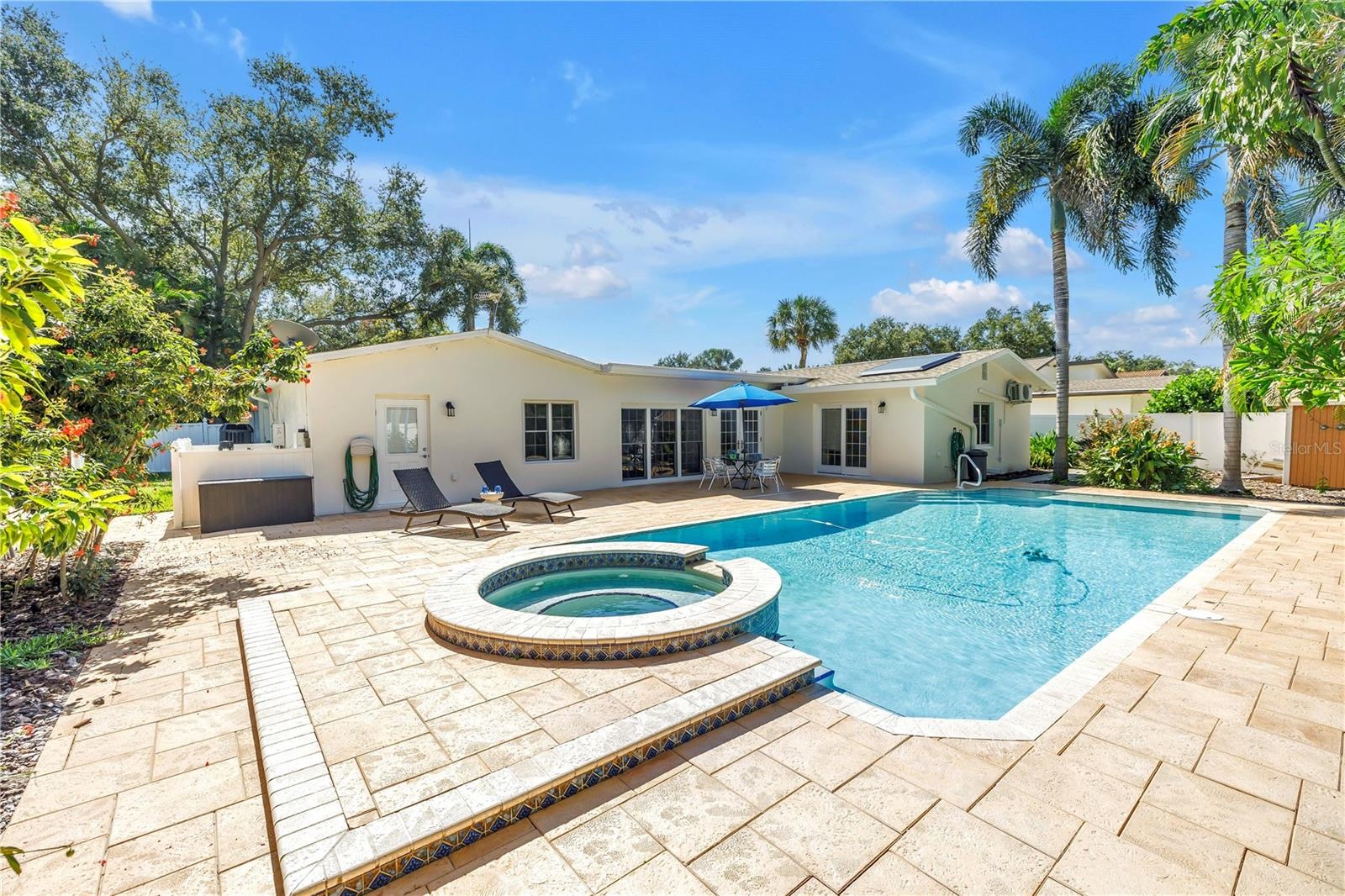 Spectacular, large, deep salt-chlorinated pool and spa area. Perfect for entertaining and party-ready!