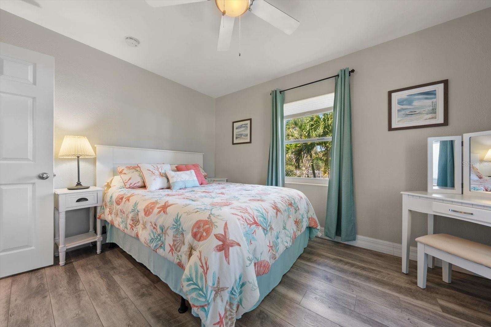 Guest bedroom overlooks backyard