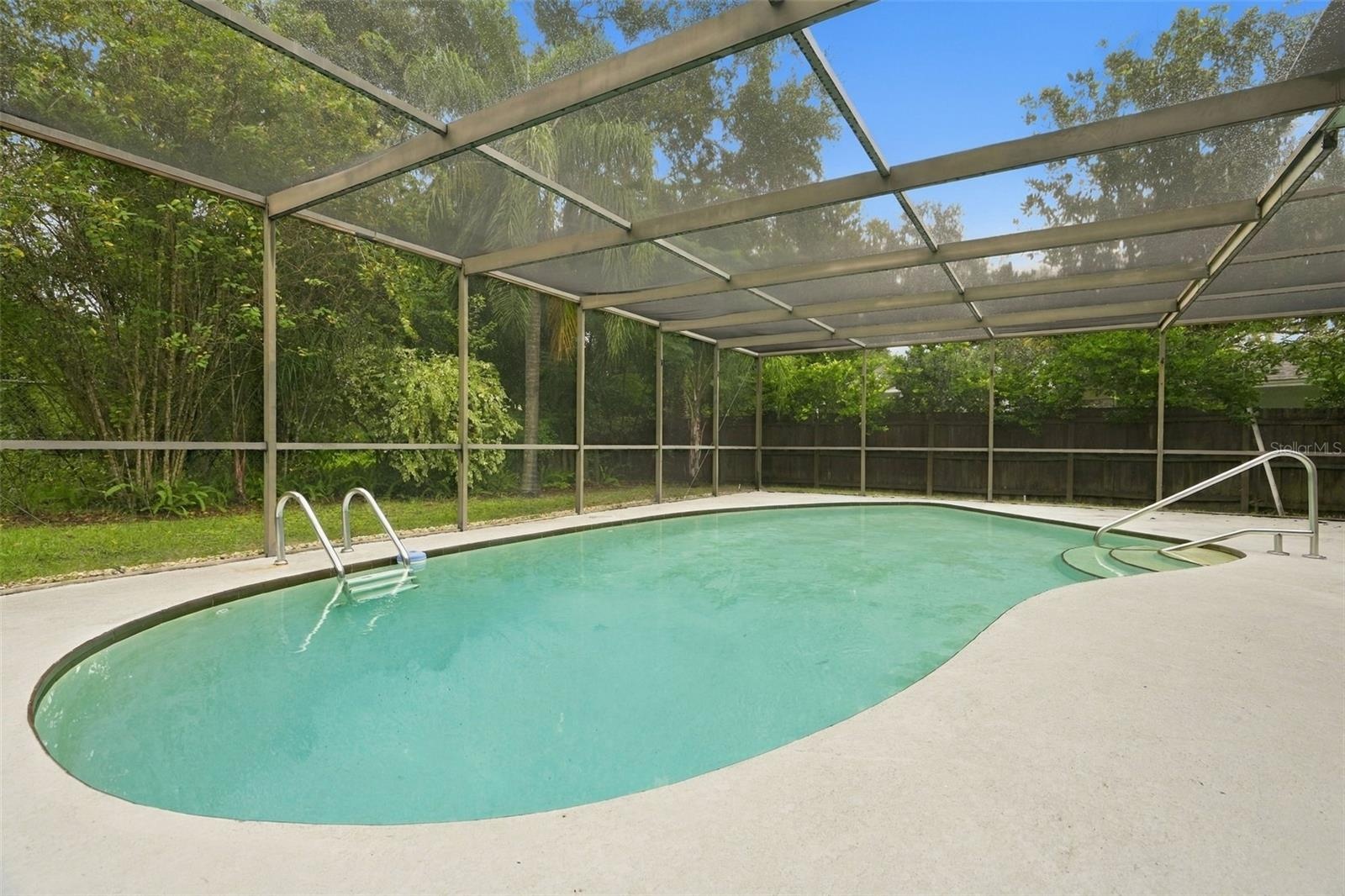 Screened enclosed pool area.