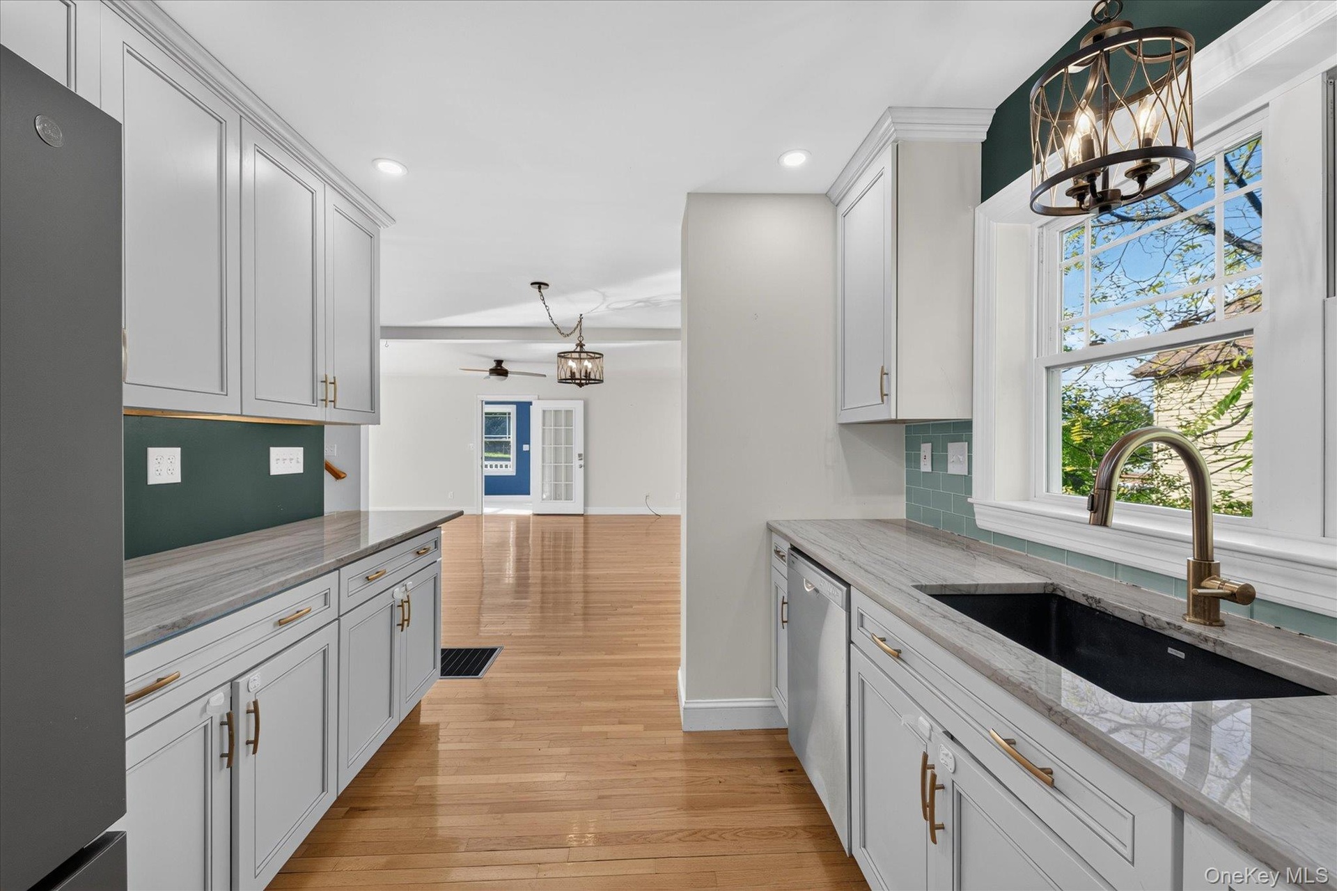 Kitchen Looking Into Dining Area And Living Room