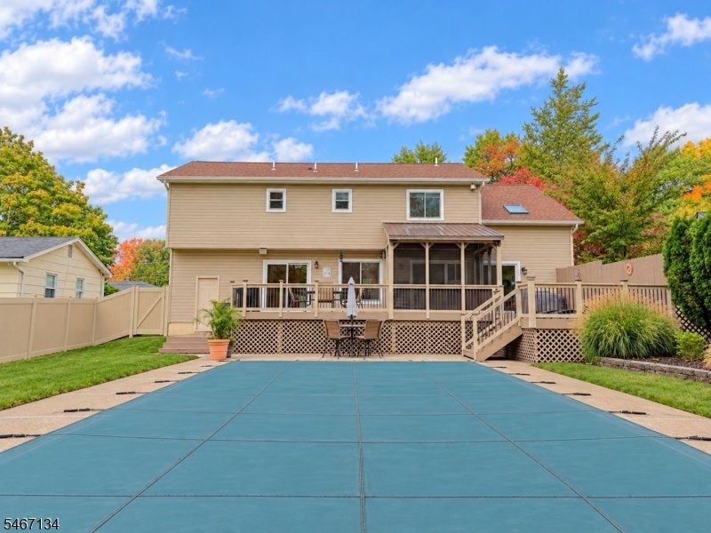 Rear Of Home Overlooking Pool