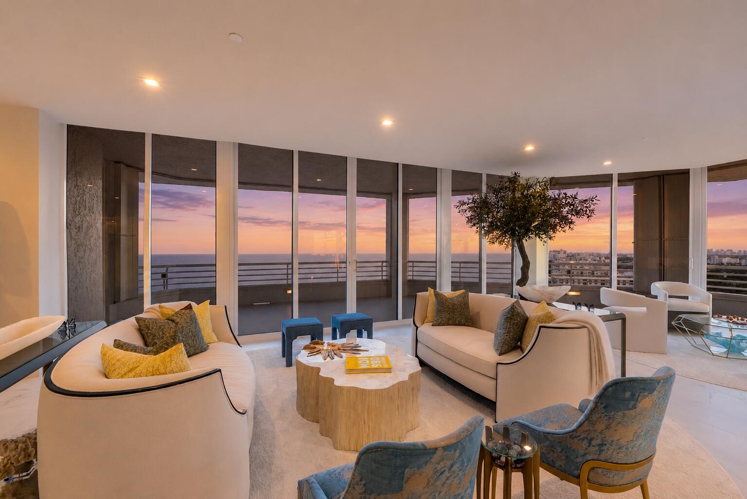 Walls of floor-to-ceiling glass blur the line between indoors and out, allowing breathtaking sunsets, shimmering waterways and the illuminated South F
