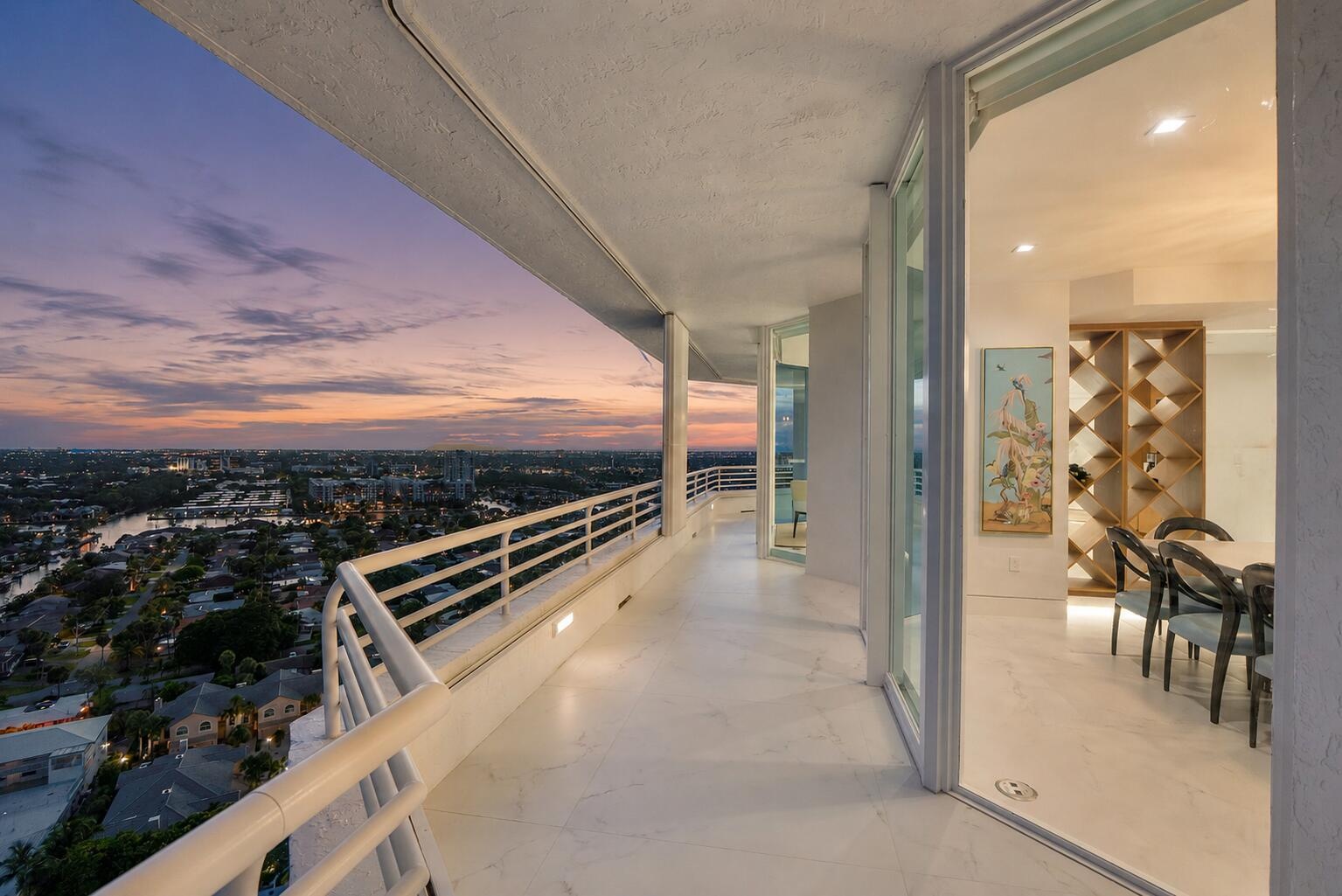 The formal dining room balcony is often opened up for the beautiful sunsets and breeze of the Atlantic air after dinner with a good bottle of wine.