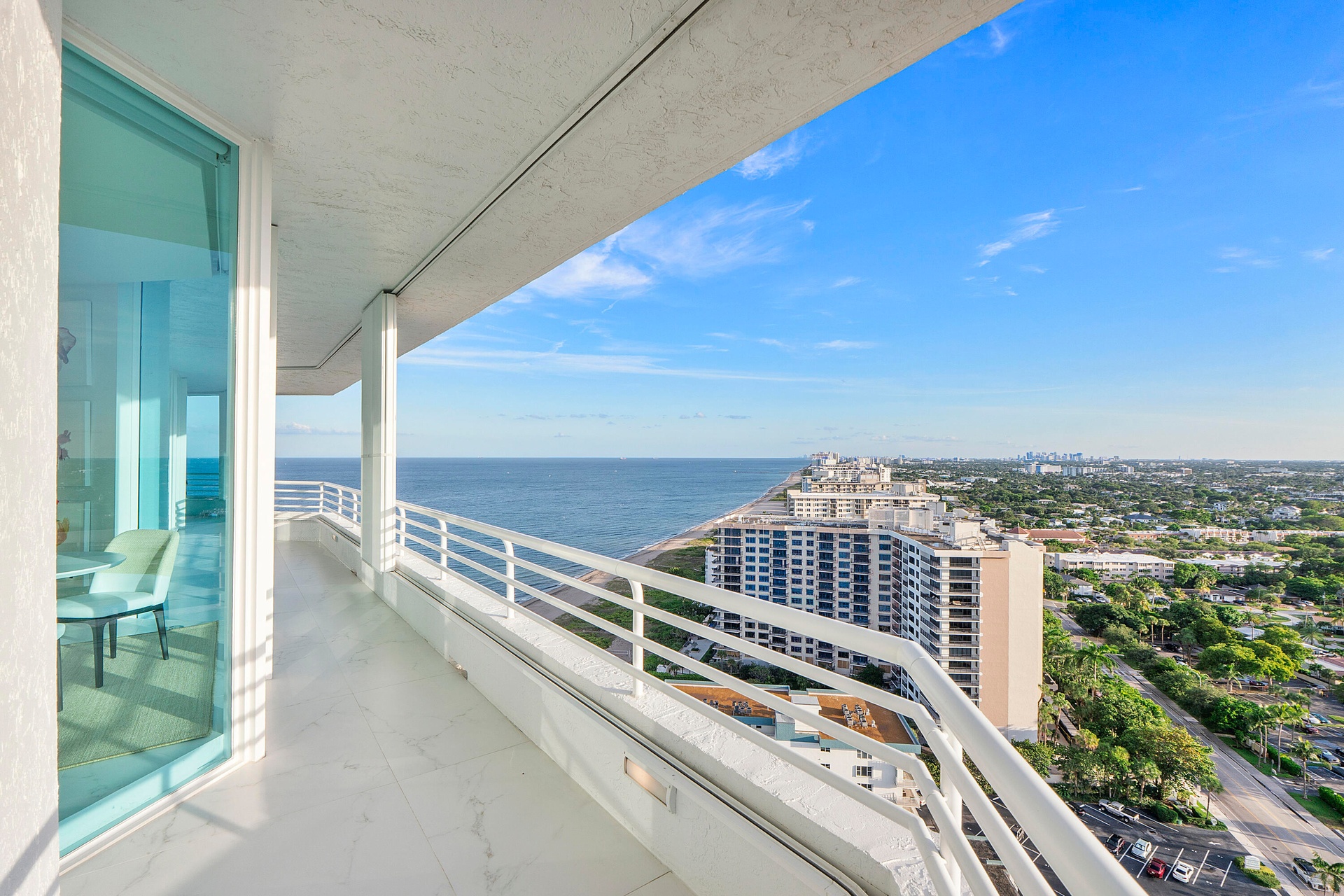 Floor-to-ceiling hurricane-impact windows and doors throughout the residence provide exceptional strength, safety and security while preserving the pe