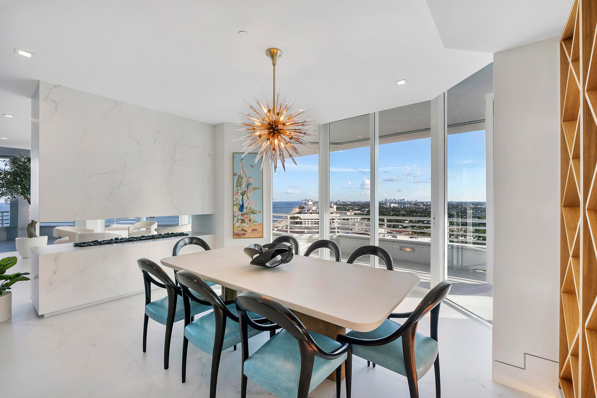 Personally designed by internationally acclaimed designer Alessandro Potenti, this breathtaking formal dining room showcases panoramic Atlantic Ocean 