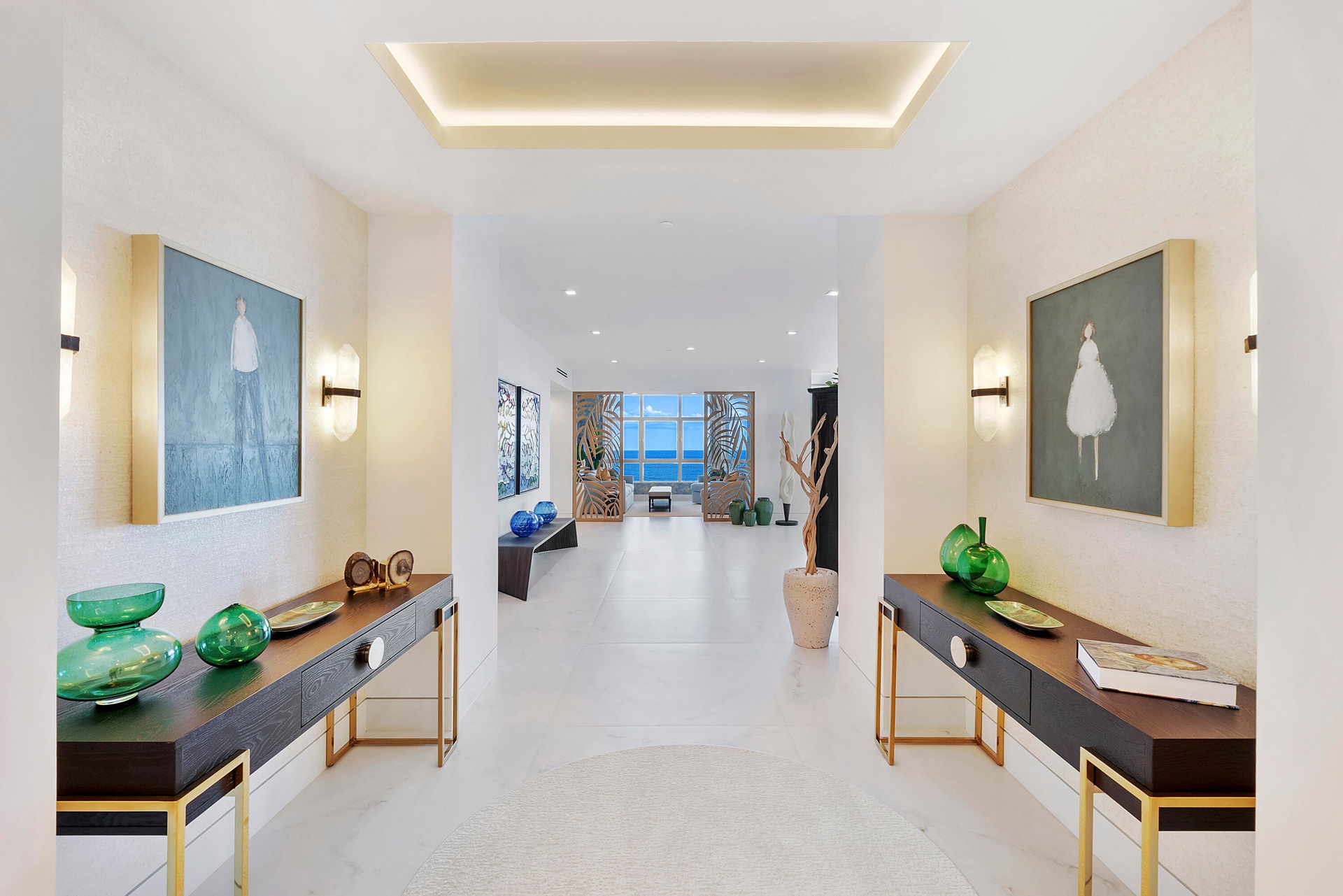 Step through the grand double-door entry into a breathtaking gallery-inspired foyer, where perfectly balanced symmetry creates an immediate sense of e