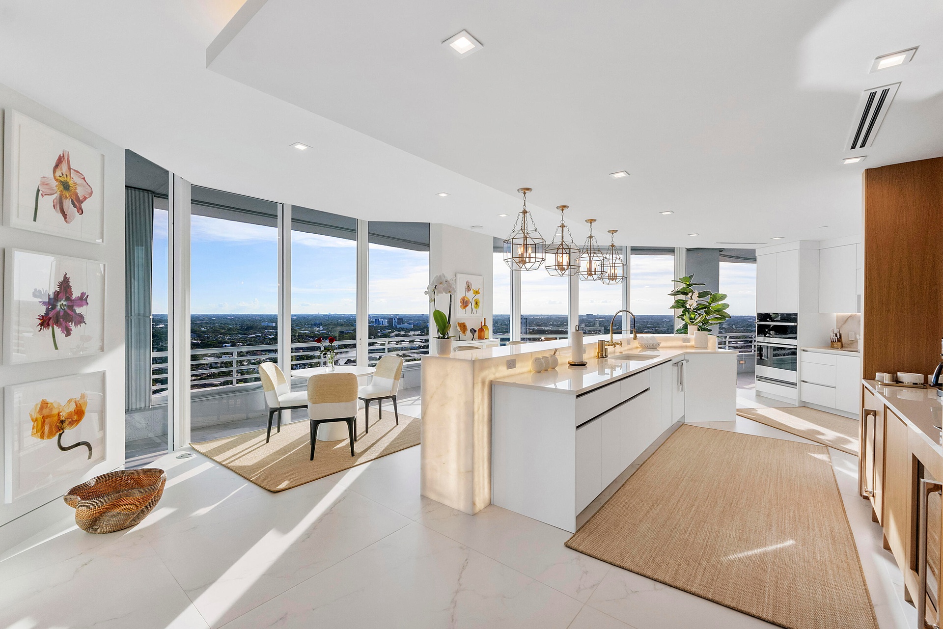 Masterfully designed by internationally acclaimed designer Alessandro Potenti, this extraordinary chef's kitchen showcases stunning backlit Cristallo 