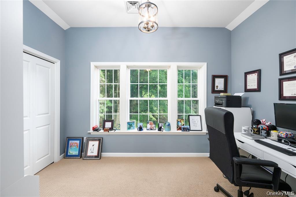 Worspace within the primary suite.