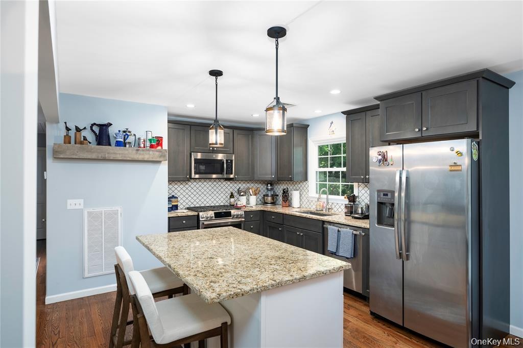 High end microwave, fridge and dishwasher.