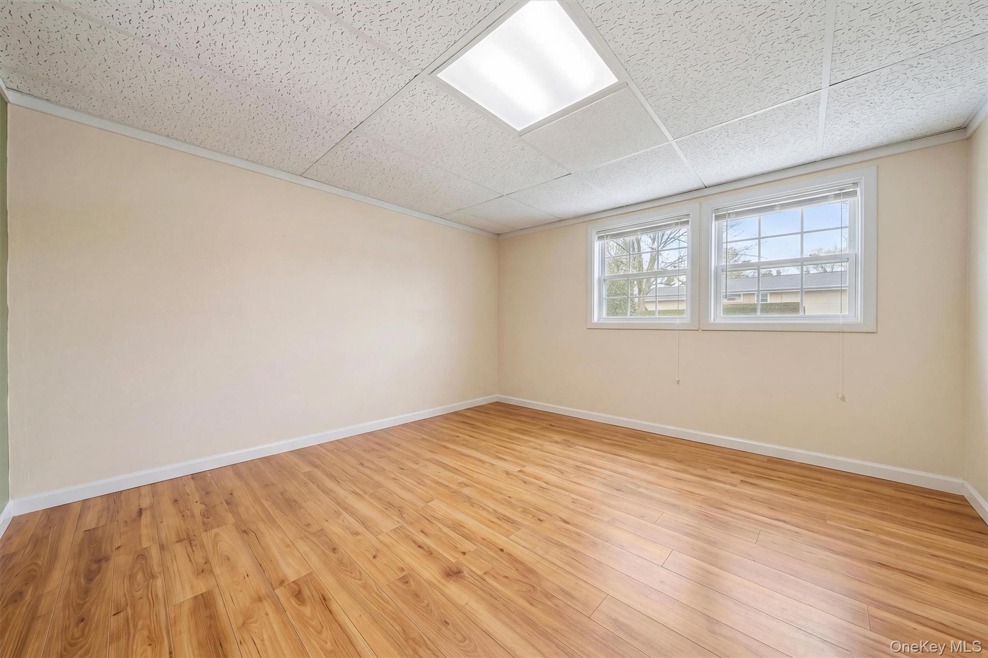 Photo was Enhanced - Decluttered. Actual Flooring is Carpet.