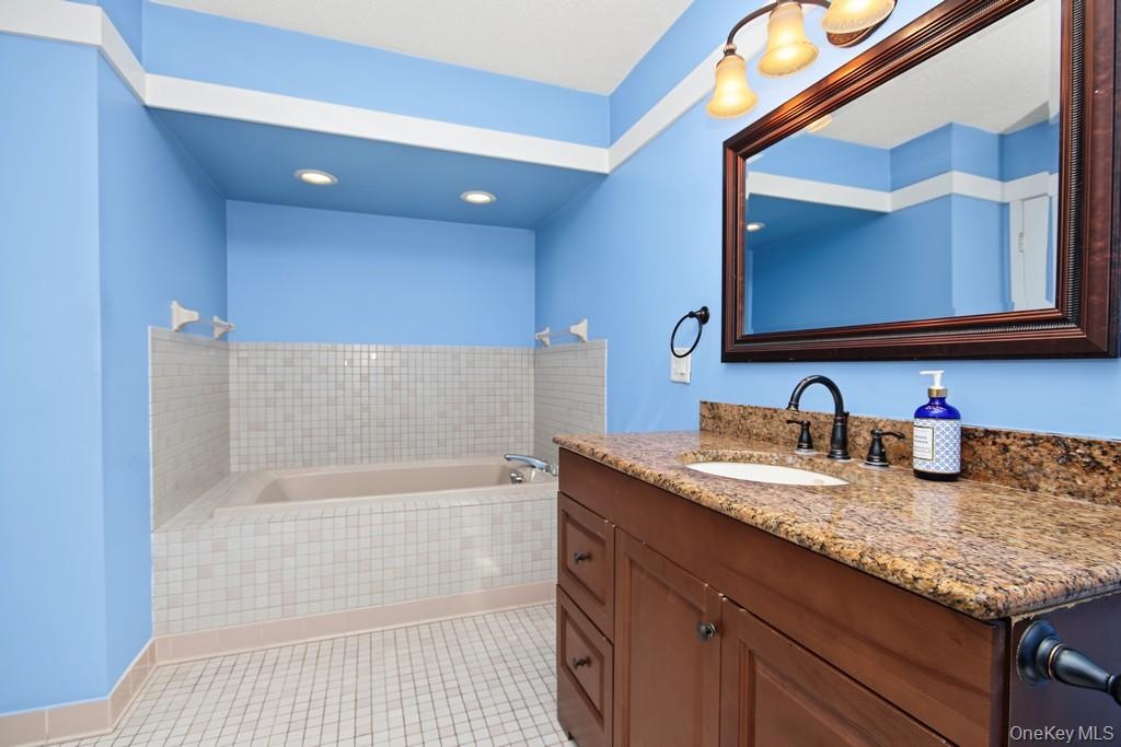 Primary Bathroom has a bathtub