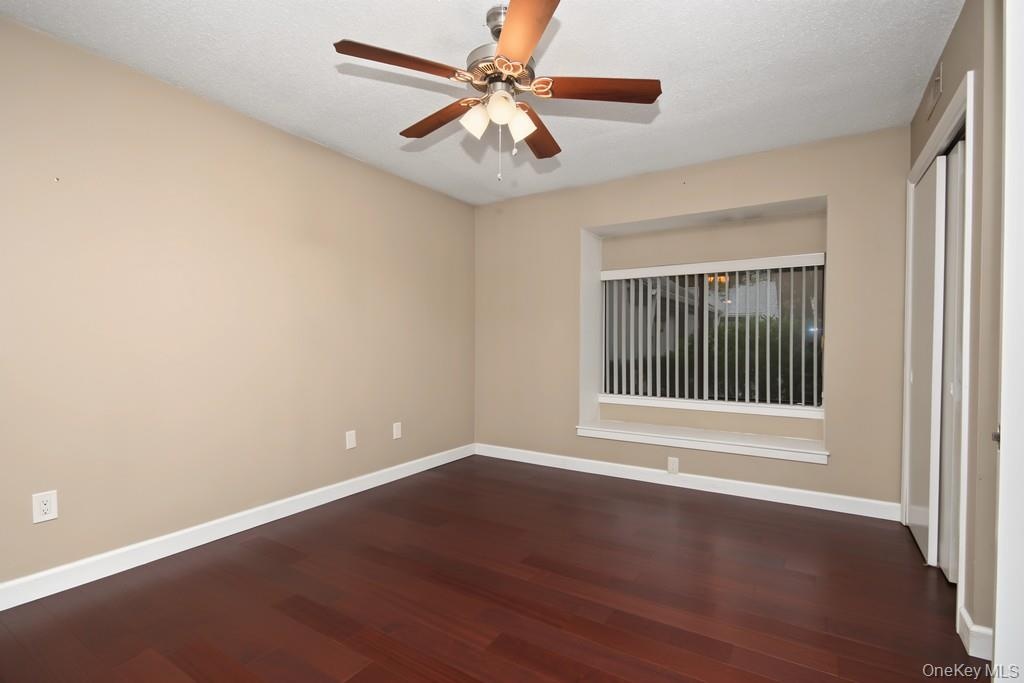 Second Bedroom has a ceiling fan with light