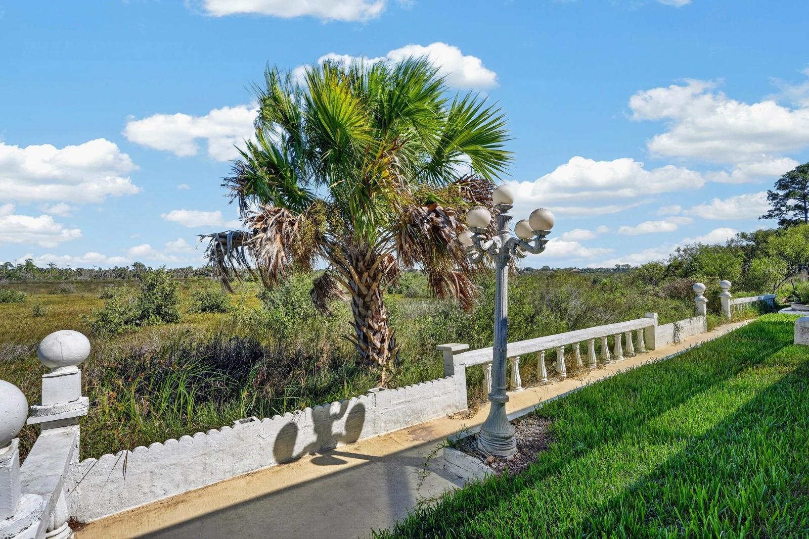 Landscaped Grounds Along Pool Enclosure