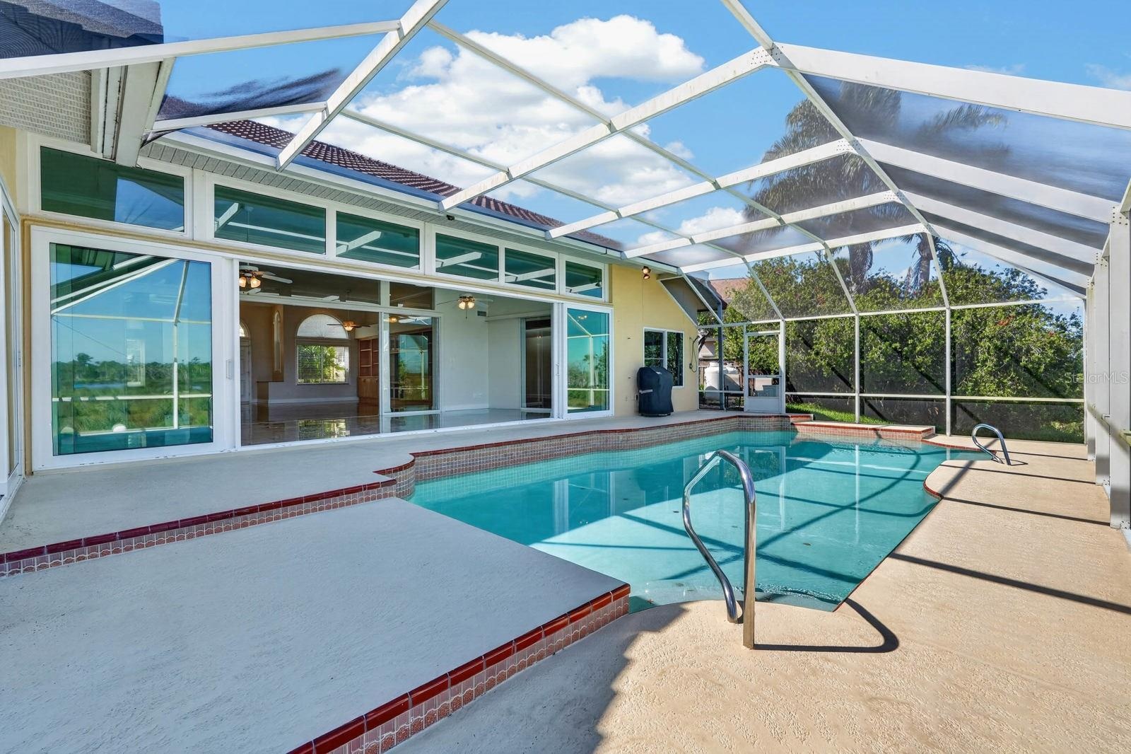 Expansive Screened Pool Retreat