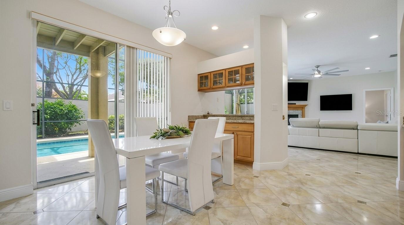 Sliding glass door leading to the pool area.