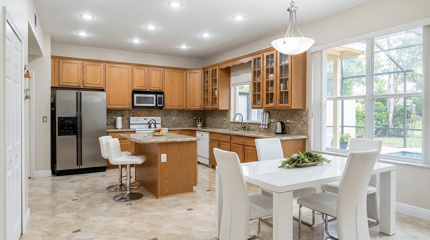 Stunning view of the outdoors, visible from both the dining room and kitchen.
